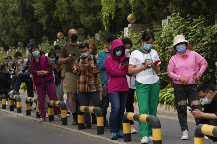 Mon. 8:48 a.m.: Beijing locks down some areas as COVID-19 cases mount